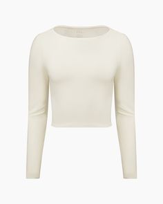 Off White Soft Stretch Seamless Tops For Loungewear, Seamless Soft Stretch Tops For Loungewear, Solid Color Long Sleeve Crop Top For Loungewear, Solid Long Sleeve Crop Top For Loungewear, Spring Crew Neck Long Sleeve Top, Seamless Elastane Tops For Loungewear, Long Sleeve Elastane Crop Top, Elastane Long Sleeve Crop Top, Solid Long Sleeve Tops With Soft Stretch