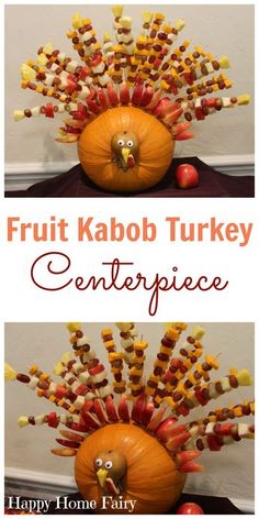 a turkey made out of pumpkins and candy sticks with the words, fruit kabob turkey centerpiece