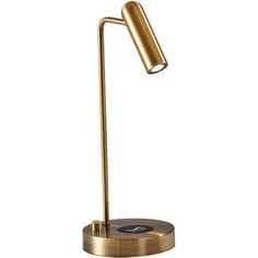 a gold desk lamp on a white background