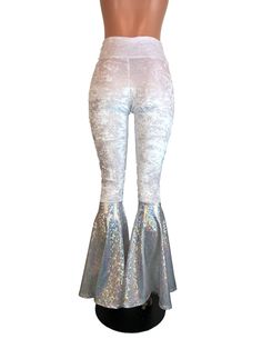 "**Due to SO MANY issues with USPS - we STRONGLY ENCOURAGE you to purchase the UPS Upgrade with your order located here: https://www.etsy.com/listing/926751536/ups-upgrade Made of stretchy white crushed velvet and silver shattered glass holographic \"bells\" on the bottom - these high-waisted bell bottoms will fit you perfectly. They hug your hips and flare out at the feet. This color is stunning! The inseam is 35\" (the mannequin is 5'8\") but can be customized by putting your desired inseam in Silver Shiny Disco Bottoms, Sparkly Bell Bottoms, Iridescent Pants, Iridescent Fitted Disco Bottoms, Silver Shiny Wide-leg Bottoms, High Waisted Bell Bottoms, Spandex Pants, 80s Outfit, Shattered Glass