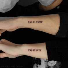 two people with matching tattoos on their arms, one has the word xxxu in roman numerals