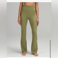 Lululemon Groove High Waisted Flare Pants, Green Color, Size 6 Never Worn. Will Take Lower Offer Just Want Gone!!! Green Flare Yoga Pants, High Waisted Flare Pants, Flare Yoga Pants, High Waisted Flares, Low Impact Workout, Flared Pants, Flare Leggings, Pants Design, Lululemon Women