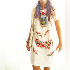 Mexican Embroidered Dress 100% Beautifully Hand-Embroidered, Intricate Hand-Stitched Designs! Color: Cream And Unique Colorful Hand Embroidery Get Ready To Turn Heads In This Stunning Mexican Dress By Aida Coronado! Each Dress Is Meticulously Hand-Embroidered With Intricate Designs, Showcasing The Rich Cultural Heritage Of Mexico. Made With Love And Attention To Detail, These Dresses Are Not Just A Fashion Statement, But A Work Of Art. Embrace Your Unique Style And Stand Out From The Crowd With White Embroidered Dress With Floral Embroidery For Vacation, Casual Multicolor Embroidered Festival Dress, White Short Sleeve Dress With Floral Embroidery, Traditional White Embroidered Neckline Dress, Traditional Short Sleeve Embroidered Dress With Geometric Embroidery, Bohemian Short Sleeve Dress With Resham Embroidery, Traditional Embroidered Dress With Geometric Embroidery And Short Sleeves, Bohemian Embroidered Dress With Resham And Short Sleeves, White Embroidered Dress With Short Sleeves