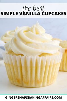 two vanilla cupcakes sitting on top of a white plate with the words, simple vanilla cupcakes