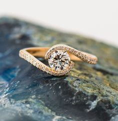 Bypass engagement ring made in 14k rose gold and set with moissanite or lab grown diamond to your selection. This listing is for ROSE GOLD. You can order other colors from the following links: ● Yellow gold - https://www.etsy.com/listing/1156849401/ ● White gold - https://www.etsy.com/listing/1161801503/ ● The pictures show the ring set with 0.5ct / approx. 5mm center stone, you can choose between lab grown diamond or moissanite for the center stone. ●The small stones are natural diamonds. ● Ava Yin Yang Ring, Bypass Engagement Ring, Lab Created Diamond Rings Engagement, Anniversary Rings For Her, Engagement Rings Twisted, Lab Diamond Engagement Ring, Swirl Ring, 18k Yellow Gold Ring, Pave Ring