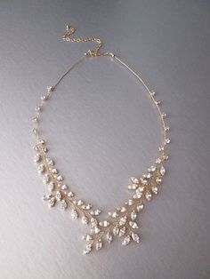 "This sparkly fun necklace is hand made using the Premium Quality European Crystal and comes in gold or silver finish. The necklace measures 22\" long and 1\" wide with the 6\" long extender. - This listing is for the necklace only  - If you would like to purchase the matching earrings please take a look here: https://www.etsy.com/listing/203769737/bridal-crystal-earrings-sparkly-crystal?ref=shop_home_active_1 * Special thanks to beautiful Erin and Jan Bon Jr. Photography for the last two photos Gold Dainty Crystal Necklace For Party, Dainty Sparkling Necklace For Party, Gold Dainty Crystal Necklaces For Party, Elegant Gold Crystal Necklace, Silver Gold Plated Costume Jewelry Necklace, Rose Gold Crystal Necklace With Sparkling Stones, Dainty Gold Rhinestone Necklace For Party, Gold Cubic Zirconia Chain Necklace For Party, Elegant Gold Crystal Rhinestone Necklace