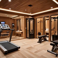 a home gym with treadmills, exercise machines and other personal care items in the room