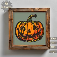 a wooden frame with an image of a pumpkin on it