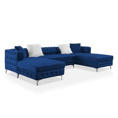 a blue sectional couch with white pillows on the top and bottom, in front of a white background