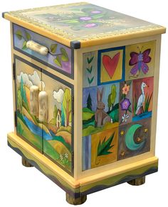 an artisticly painted wooden box with animals on it