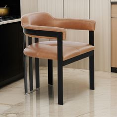 a chair sitting in the middle of a kitchen