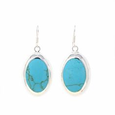 Handcrafted silver-plated oval earrings with man-made turquoise. Earring drop is 1.5". Sterling silver loops. - Nota: Este producto se encuentra en los almacenes de nuestro Chiwi Fairtrade Partner en Florida, EEUU. Se puede tardar de 5 a 7 días laborables para estar disponible para "Pick Up" o “Delivery” - Turquoise Earring, Earring Drop, Oval Earrings, Heart Quilt, Earrings Turquoise, Oval Earring, Women Artisans, Traditional Jewelry, Silver Turquoise