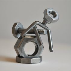 a metal object with nuts and bolts attached to it