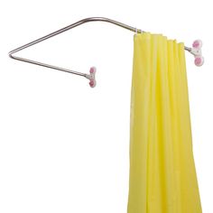 a yellow shower curtain is hanging on a metal pole with two hooks and a white background