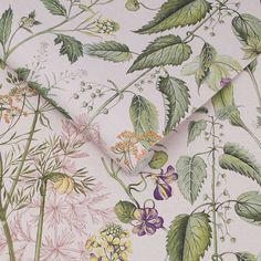 the wallpaper has many different types of flowers and leaves on it's surface