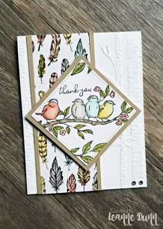 two birds on a branch with leaves and thank you card