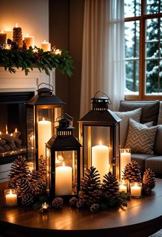 three lit candles are sitting on a table in front of a christmas tree and fireplace