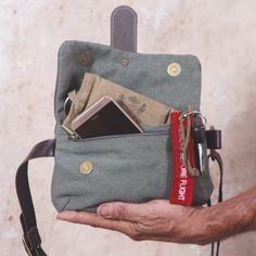 "Cross Body Fanny Pack, Leather and Canvas Hip Bag, Bum Bag, Fanny Pack, Unique Hip Bag, Green Canvas Bag, Soft Leather Bag, Festival Bag This is one of my favorite style of bags. It is practical but has unique design elements that makes it stand out from the crowd! This hip bag is lovingly handmade from the finest, softest, Italian leather, which is so lovely to touch, and super durable. Closes securely and conveniently with two strong magnetic clasps. This bag is perfect for wearing at festiva Green Belt Bag With Pockets For On-the-go, Travel Canvas Satchel With Mobile Phone Bag, Satchel Belt Bag With Zipper Pocket For Daily Use, Travel Belt Bag Satchel With Removable Pouch, Daily Use Satchel Belt Bag With Zipper Pocket, Travel Belt Bag Satchel With Cell Phone Pocket, Travel Belt Bag With Cell Phone Pocket, Travel Canvas Shoulder Bag With Cell Phone Pocket, Canvas Pouch For Everyday Use