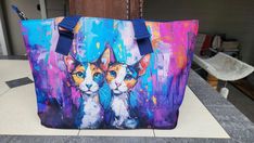 This Pup Friends tote is absolutely perfect for any cat lover. Original whimsical, colorful and edgy, it features one of a kind elegant artist-inspired dog design, a perfect size AND a zipper to keep things safe, you will not need any other tote bag for your day to day with your kitty. This one is a Pup Culture Designs favorite and sure to become one of our most popular designs. We can almost guarantee it will be one of yours, too. - Measures: 11''(L) x 17.7'"(W) x 4.7''(H) - Non-fading and non- Casual Multicolor Cat Design Shoulder Bag, Casual Multicolor Shoulder Bag With Cat Design, Playful Multicolor Bags With Cat Design, Multicolor Cat Design Tote Bag, Multicolor Tote Bag With Cat Design, Multicolor Cat Print Bags For Daily Use, Multicolor Cat Print Bags For Everyday Use, Multicolor Rectangular Bag With Cat Print, Multicolor Rectangular Bags With Cat Print