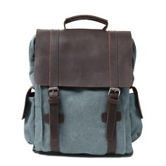 Elevate your everyday look with this small canvas backpack. This classic rucksack blends rugged charm with practical features for a stylish and functional accessory. Rustic Elegance: Crafted from blue cotton canvas and genuine leather, this backpack adds a vintage touch to any outfit. Modern Convenience: Despite its retro design, this backpack includes waterproof protection and quilted pockets for your phone and laptop. Unique Character: The vintage materials age beautifully, giving each backpac Travel Camera Bag, Leather Backpack Handbag, Canvas Laptop Bag, Tactical Wallet, Leather School Backpack, Vintage Backpacks, Women Leather Backpack, Canvas Messenger Bag, Small Canvas