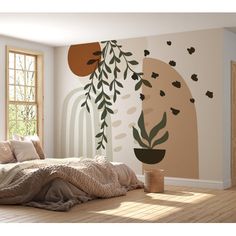 a bed sitting under a window next to a wall with plants on it and birds flying around