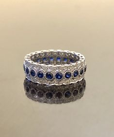 DeKara Designs Collection Metal- 14K White Gold, .583. Stones- Genuine Round Blue Sapphires 20-24 Round 1.60-1.90 Carats, 154-178 Round Diamonds F-G Color VS1-VS2 Clarity 0.60-0.85 Carats (Carat weight and Number of Stones Depends on your finger size) Size- 3-13 Band is 6.5 MM Wide and has a Height of 2 MM. Please indicate your specific size by sending me a conversation on etsy, or putting it in the notes of the transaction. Band will be made in your size within 5-7 working days. Will start work Sapphire Band, Engagement Band, Gold Art Deco, Engagement Bands, Art Deco Diamond, Diamond Wedding Band, Diamond Eternity, Gold Art, Sapphire Engagement