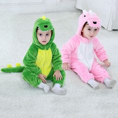 Cute baby Halloween dinosaur costume coverall tailored for newborn, infant & toddler boys and girls. Long sleeve dress up jumpsuit with dino face on head. Lovely features attached on hoodie and long reptile tail on back. Banded cuffs to keep sleeve from riding up. One piece outfit with front zip closure for quick dressing and diaper changing. Nickel free zips to prevent skin irritation. Soft cotton material ideal for young skin. Clothing is machine wash safe. More sizes and colors are available Dinosaur Onesie, Halloween Dinosaur, Dinosaur Outfit, Twin Toddlers, Winter Outfits For Girls, Dinosaur Costume, Halloween Long Sleeve, Baby Dinosaurs