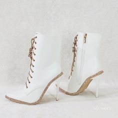 Brand New White Vegan Leather Upper Rose Gold Trim On Tongue & Footbed. Adjustable Rhinestone Capped Laces Lace Up The Front Slim Stilettos Heels Stunning Sparkle & Soo Delightful To Look At. White High Ankle Boots For Party, Glamorous White Boots For Spring, Glamorous White Spring Boots, White Ankle Boots For Parties, White High Heel Boots With Rhinestones, White Rhinestone High Heel Boots, White Ankle Boot Heels For Party, Tie Up Boots, Stilettos Heels