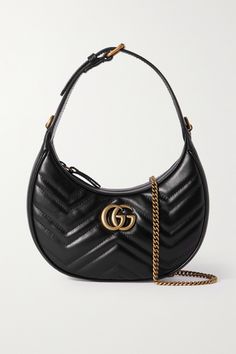 Gucci's 'Marmont' bag has a timeless, vintage feel - from the antique gold-tone hardware to the chain shoulder strap. It's been crafted in Italy from supple black leather in a crescent moon shape and is detailed with the house's 'GG' moniker. The top unzips to reveal a handy slip pocket for your most-used cards. Gucci Crescent Bag, Gucci Shoulder Bag Black, Black Purse Gold Hardware, Gucci Black Bag, Gucci Bag Marmont, Gucci Bag Black, Gucci Monogram Bag, Black Gucci Bag, Gucci Mini Bag