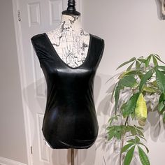 Nwot Faux Leather Vintage Y2k Glossy Shiny Wet Keyhole Bodysuit Monokini One Piece Top Blouse Rave Punk Rockstar Club Nigh Tout Whimsygoth No Tag With Size, Brand Or Fabric Sz S/M Mannequin Is Sz S For Your Reference Edgy Sleeveless Party Bodysuit, Edgy Black Sleeveless Bodysuit, Edgy Sleeveless Bodysuit For Party, Fitted Sleeveless Rave Bodysuit, Sleeveless Rave Bodysuit, Edgy Sleeveless Bodysuit For Night Out, Black Stretch Bodysuit For Costume Party, Black Rave Bodysuit For Parties, Black Fitted Rave Bodysuit