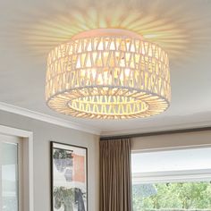 a living room scene with focus on the ceiling light