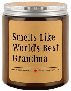 smells like world's best grandma candle in a glass jar with an orange label