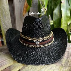 This black cowgirl hat has a Bull Charm with gold details and shells. A coastal cowgirls dream! All hats are around 22-24 inches inside but come with an adjustable string that can tighten the hat inside. Check out my Instagram @delisico *PLEASE MESSAGE ME IF YOU NEED FOR A SPECIFIC DATE. BIRTHDAY, CONCERT, EVENT* Black Summer Hat Bands For Ranch, Bohemian Gold Hat Bands For Country Events, Gold Western Hat For Country Events, Adjustable Gold Hat Bands For Country Events, Gold Country Style Hat Bands For Country Events, Gold Adjustable Hat Bands For Country Events, Gold Country Style Hat For Rodeo, Adjustable Gold Country Hat Bands, Country Style Adjustable Bucket Hat Band