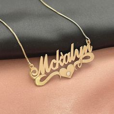 "Name Necklace with Heart and Birthstone-Personalized Nameplate Necklace for Women Gifts. This necklace has a unique style and a personalized name necklace with an underlined Heart makes your gift special. The chain material is 925 sterling silver or 24K gold plating and you can choose a length of 14-22 inches. M A T E R I A L S: Style: Name Necklace with Heart. Materials:  925 Sterling Silver, 24K Gold Plated Pendant Size: 45 mm - 1.8\" / 17mm - 0.7\". Thickness: 0.7mm / 0.03\" Chain Style: Box Chain. Chain Length Options: 14\" 16\" 18\" 20\" 22\". H O W    T O   O R D E R:  Please write your name and the desired length for the chain when placing your order. G I F T S: All my items are packaged and ready to gift in an ELEGANT GIFT BOX FOR FREE! The packaging is bubble-wrapped to ensure it Elegant Nameplate Necklace With Birthstone, Sterling Silver Name Necklace For Anniversary, Signature Sterling Silver Name Necklace For Anniversary, Sterling Silver Nameplate Necklace For Anniversary, Elegant Name Necklace With Hallmarks For Birthday Gift, Signature Nameplate Necklace As Gift, Anniversary Nameplate Name Necklace With Hallmarks, Signature Nameplate Necklace For Gift, Silver Birthstone Nameplate Necklace