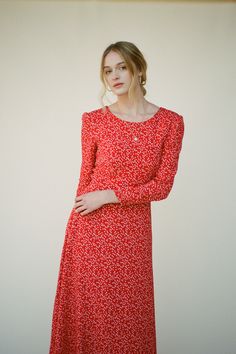 The Marisol is an effortless long sleeve midi dress, with it's season-less appeal you'll reach for it time and time again. THE CUT It features a semi fitted bodice, crew neckline, a relaxed floaty A-line skirt, long sleeves and covered buttons at the cuff. The Marisol define's your waist without clinging to it. An easy day to night piece, simply swap out your flats for heels and your ready to go. Dress Measurements: For a more fitted look we recommend you take one size smaller than normal. XS (0 Casual Red Long Sleeve Dress For Spring, Fall Ditsy Floral Print Midi Dress, Fitted Red Long Sleeve Spring Dress, Red Midi Dress For Daywear In Fall, Red Midi Dress For Fall Daywear, Red Long Sleeve Midi Dress For Spring, Modest Red Spring Dress, Red Long Sleeve Midi Dress, Easy Day