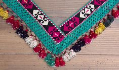 "almost 14.00 cm x 148.00 cm = 5.51\" x 58.27\" red white black green pink yellow purple orange 1940s - 50s from Uzbekistan handmade tassel - segusha dry clean only VINTAGE UZBEK TASSELS : \" Segusha \" ( Triangle ) is a decorative embellishments, whose function, was to decorate the beddings tucked away folded against the walls of a yurt or tent. These objects made with great care were attached on the corner of squarish textiles and used as covers . The silk tassels with beads and metal work are Bohemian Dupatta With Woven Motifs For Ceremonial Use, Bohemian Festive Dupatta With Tassels, Bohemian Dupatta With Motifs For Festival, Bohemian Festival Dupatta With Traditional Patterns, Bohemian Dupatta With Motifs, Bohemian Dupatta With Tassels For Festivals, Bohemian Dupatta For Rituals, Traditional Festival Dupatta With Tassels, Bohemian Festival Dupatta With Tassels