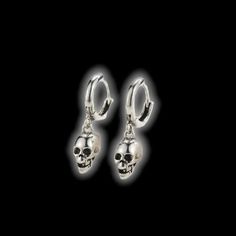 Silver plated hoop Star shaped stud Free delivery MSRP of 14.99 Euros Gold or sterling silver JAN drop earring jewelry Chain shop women Introducing the Skull Rocker Earrings These sterling silver earrings are designed to make a bold statement. Featuring a punk-inspired design with a star-shaped stud and a silver-plated hoop, these earrings are perfect for any rocker or fashionista. With their free delivery and affordable price of 14.99 Euros, these earrings make the perfect gift for yourself or Hypoallergenic Punk Dangle Earrings, Hypoallergenic Dangle Earrings In Punk Style, Trendy Silver Skull Jewelry, Edgy Silver Drop Earrings, Edgy Sterling Silver Dangle Earrings, Edgy Pierced Drop Earrings, Silver Tarnish-resistant Piercings, Edgy Nickel-free Dangle Earrings, Nickel-free Metal Huggie Jewelry