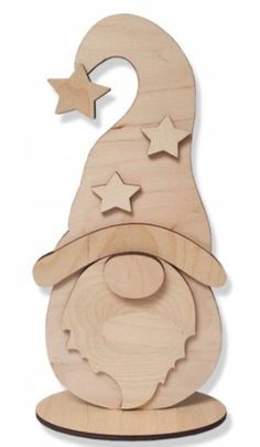 a wooden toy with stars and a gnome's hat on the top of it