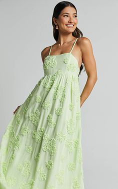 Get ready to turn heads in the Claya Maxi Dress. This vibrant lime dress is perfect for those sunny summer days or special occasions. With its sleeveless design and straight neckline, it offers a flattering fit that will make you feel confident and empowered. The floral detail adds a feminine touch, while the A-line silhouette creates a flowy and romantic look. Made from a combination of rayon and polyester, this dress is not only comfortable but also durable, ensuring that you can wear it time Summer Backless Dress, Summer Floral Dresses, Backless Summer Dress, Lime Dress, Bust Dress, Floral Clothing, Everyday Dress, Dress Backless, Maxi Gown