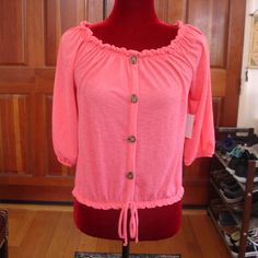 2/$12: Pick Any 2 Different Items From This Category For $12 W/ 1 Package Shipping. Free Kisses: New With Tag Women's Size Medium Peasant Top, Coral Color. Light & Comfortable, This Sheer Top Features 4 Decorative Front Buttons. Length: 17", Sleeve: 15", And Pit To Pit: 16". Free Kisses, Kiss Pink, Peasant Top, Peasant Tops, Sheer Top, Coral Color, Color Light, Pink And Orange, Top Blouse