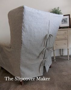 a chair with a stripped cover on it