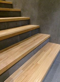 the stairs are made of wood and metal