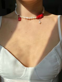 Red coral, pearl and sea shell choker necklace. Delicately made by hand with freshwater pearls, sea bamboo coral beads and natural sea shells. One of a kind. These necklaces are more than just a final touch to your look, it's a bold statement of who you are. It's a way of showcasing your aesthetic and letting your inner self shine. Available in three styles: STYLE I: White Sea shells and sea bamboo coral beads. Necklace length: 37 cm // 14.56 inch + 5cm // 2 inch extension chain. Two dangle pendants (length: 3cm). Stainless steel lobster clasp closure (it's hypoallergenic, doesn't rust or tarnish). STYLE II: Freshwater pearls and sea bamboo coral beads. Necklace length: 37 cm // 14.56 inch + 5cm // 2 inch extension chain. Stainless steel lobster clasp closure (it's hypoallergenic, doesn't Cheap Beaded Necklaces With Lobster Clasp For Beach, Coral Pearl Necklace, Red Pearl Necklace With Pearl Charm As Gift, Handmade Red Shell Necklace For Gift, Red Pearl Necklace With Charm As Gift, Red Pearl Beaded Necklaces With Pearl Chain, Handmade Elegant Red Coral Necklace, Handmade Red Shell Necklace Gift, Red Pearl Necklace With Pearl Drop