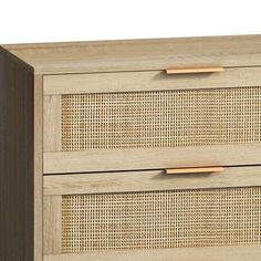 the two drawers are made from wood and have rattan weaves on each drawer