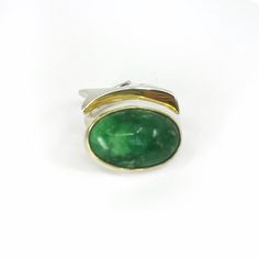 Size 7 Modern Oval Green Jewelry, Elegant Green Cabochon Emerald Ring, Formal Green Cabochon Emerald Ring, Elegant Green Emerald Cabochon Ring, Elegant Polished Turquoise Ring, Elegant Turquoise Ring With Polished Finish, Modern Cabochon Emerald Ring For Formal Occasions, Modern Green Oval Cabochon Jewelry, Modern Formal Emerald Cabochon Ring