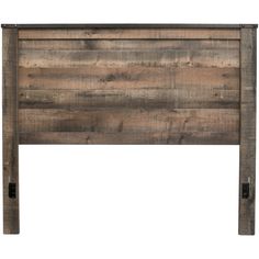 the headboard is made from wood and has metal bars on each side, along with two