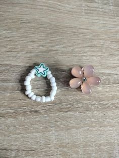 This ring has a random charm color, and it is made of white seed beads. This ring also comes with the hair clip in the photos. Clip Ins, Hair Clip, Hair Clips, Seed Beads, Jewelry Rings, United States, Accessory Gift, Display Homes, Electronic Accessories