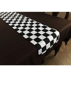 a black and white checkered table runner