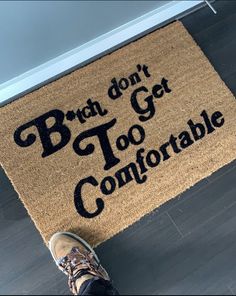 someone standing in front of a door mat that says, brah don't get too comfortable