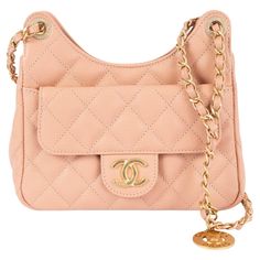 100% authentic Chanel Wavy Hobo Small shoulder bag in beige-peach Caviar leather. Features a front flap pocket with magnetic snap, an open back pocket, light gold-tone hardware. Lined in beige grosgrain fabric with an open pocket against the back. Comes with dust bag, authenticity card and store receipt. Measurements Model 23P AS3710 B10233 NM375 Height 13cm (5.1in) Width 19cm (7.4in) Depth 6cm (2.3in) Drop of the Handle 53cm (20.7in) Shoulder Strap Length 105cm (41in) Hardware Light Gold-Tone B Beige Shoulder Bag With Cc Turnlock For Everyday Use, Shoulder Bag With Cc Turnlock Closure For Shopping, Evening Tote Shoulder Bag With Cc Turnlock Closure, Pink Shoulder Bag With Cc Turnlock Closure, Elegant Pink Shoulder Bag With Cc Turnlock Closure, Everyday Beige Flap Bag With Cc Turnlock Closure, Shopping Tote Shoulder Bag With Cc Turnlock Closure, Leather Tote Shoulder Bag With Cc Turnlock Closure, Luxury Blush Formal Bags